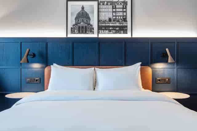 Modern Radisson Blu Scandinavia hotel guest room for corporate events and business conferences.