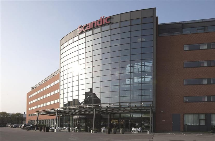 Scandic Sydhavnen hotel exterior with covered arrival area for corporate meetings and group events.