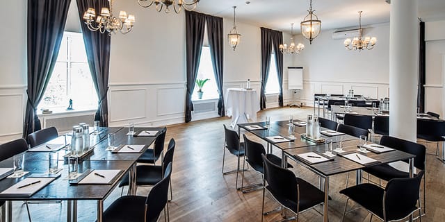 Kokkedal Slot Copenhagen U-shape meeting room for corporate workshops and professional board events.