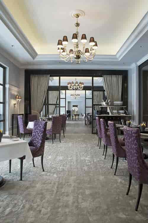 Elegant Marchal event space for luxury dining and corporate board meetings.