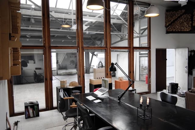 Industrial-chic creative studio and breakout space for corporate meetings and brainstorming events.