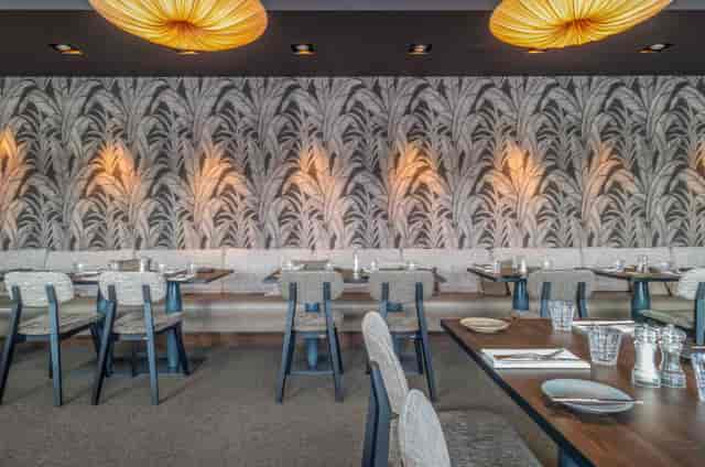 Stylish restaurant interior in Main Nizza, perfect for intimate gatherings and corporate events.
