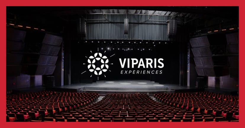 Berlioz amphitheater stage with high-contrast branding for corporate keynotes and presentations.
