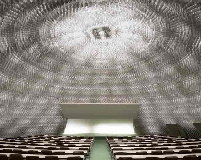 Espace Niemeyer auditorium with textured dome, ideal for keynote presentations and brand events.