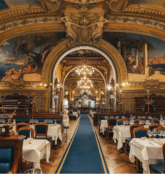Historic Le Train Bleu banquet hall for luxury galas and VIP dinner events.