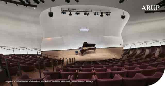 Stephen A. Schwarzman Auditorium with minimalist seating for upscale presentations and performances.