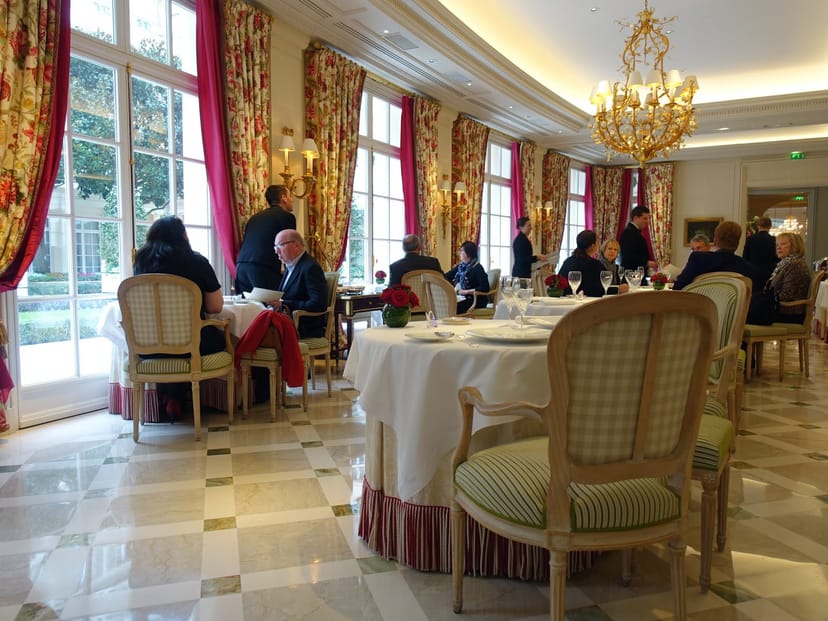 Upscale private dining room with floor-to-ceiling drapery for executive lunches and VIP events.