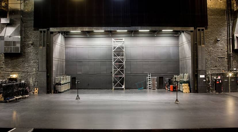 Salle Jean Vilar stage at Chaillot Theatre, industrial production load-in space.