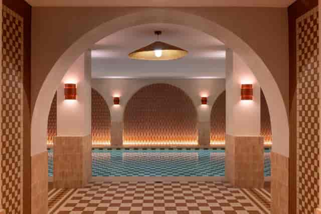 Luxury spa venue with dramatic archways for upscale brand activations and corporate receptions.