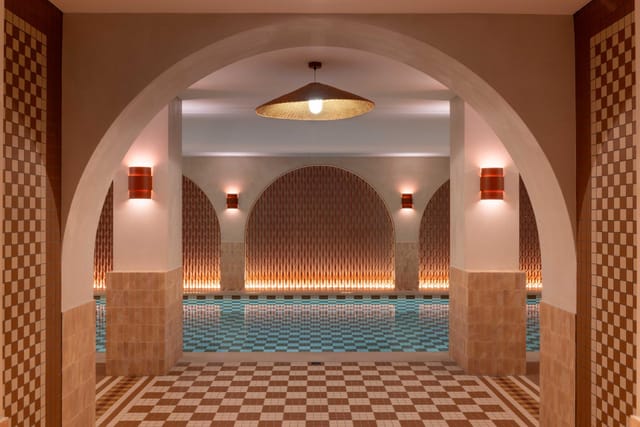 Luxury spa venue with dramatic archways for upscale brand activations and corporate receptions.