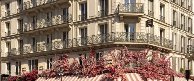 Haussmann-style Hôtel Émile exterior for boutique weddings and corporate brand activation events.
