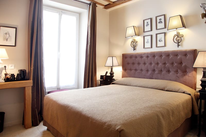 Boutique hotel room at Hôtel Saint Louis en l'Isle for VIP accommodations and executive retreats.