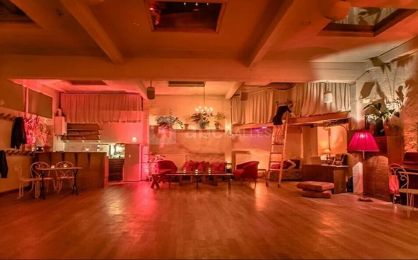 Industrial event space in Loft Lechapelais with mezzanine for networking mixers and receptions.