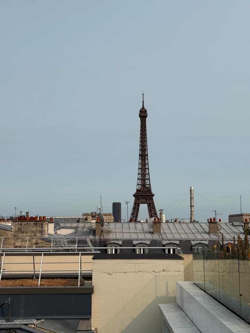 Rooftop bar at Canopy by Hilton Paris with Eiffel Tower view for corporate events and incentives.