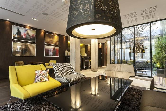 Hôtel Duo lounge breakout space with contemporary seating for VIP networking and small events.