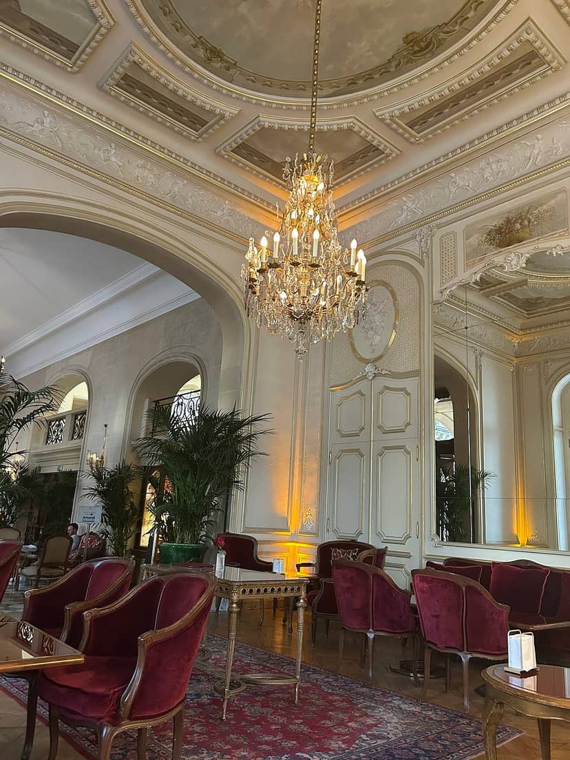 Luxury hotel ballroom with crystal chandeliers for elegant receptions and networking events.