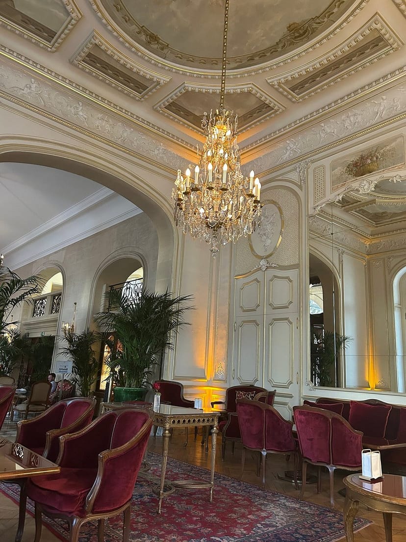 Luxury hotel ballroom with crystal chandeliers for elegant receptions and networking events.