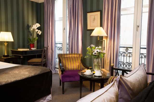 VIP hotel suite with workspace for boutique business meetings and luxury travel.