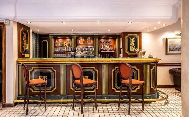 Mahogany bar at Villa Beaumarchais, perfect for VIP hospitality and networking events.