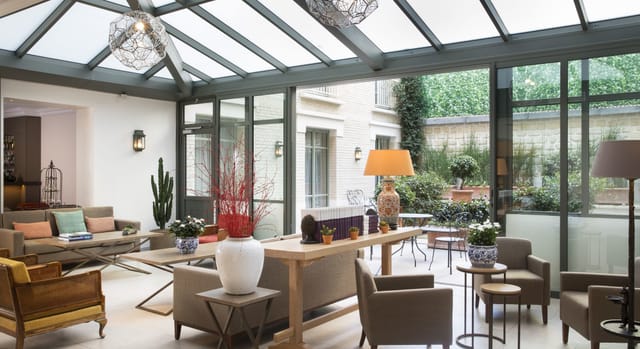 Hôtel Le Littré conservatory meeting room for VIP networking and high-end corporate events.