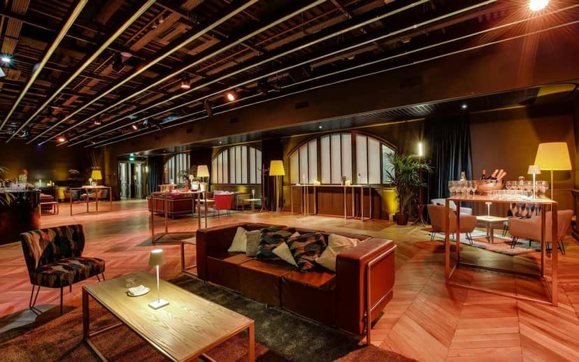 Industrial-chic Salle Longchamp lounge for VIP receptions and networking events.
