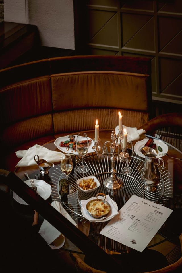 Private dining at Temple & Chapon: luxury banquette seating for upscale events.