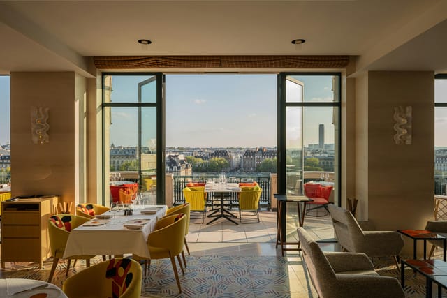 Le Tout-Paris bar with iconic city views for corporate dinners and VIP receptions.