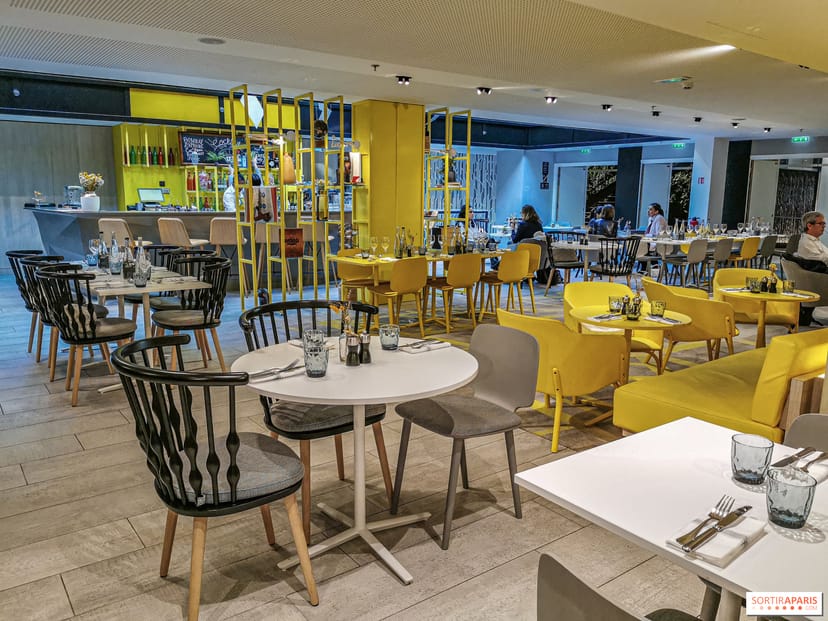 Contemporary event space with high-top seating for networking receptions and coffee breaks.