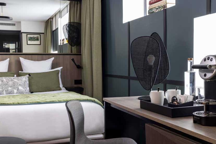 Executive suite at Hotel Opéra Liège with workspace for business travel and corporate stays.