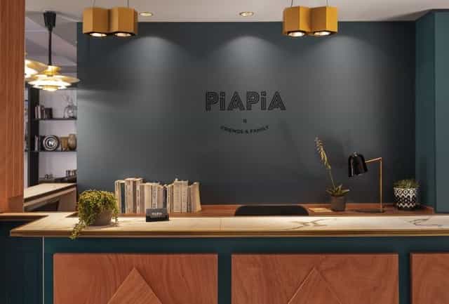 Boutique reception desk at Hôtel Piapia for intimate VIP event registration and check-in.