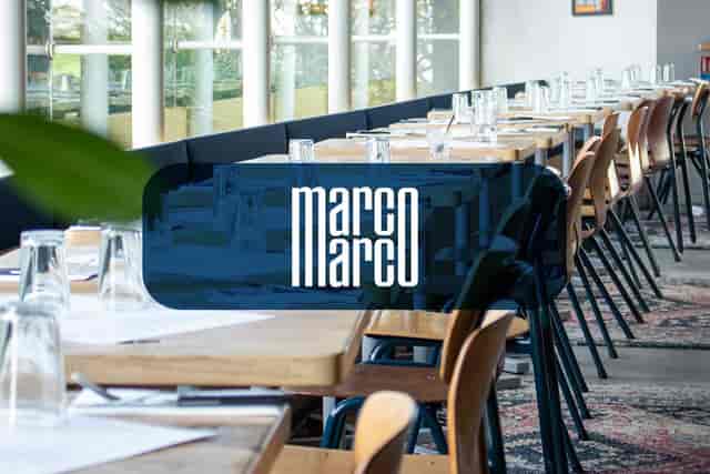 Marco Marco banquet setup at Oxygen La Défense: modern, naturally lit event venue.