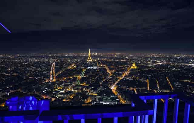 Paris rooftop terrace at night for premium corporate receptions and exclusive gala events.