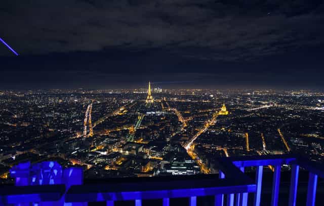 Paris rooftop terrace at night for premium corporate receptions and exclusive gala events.