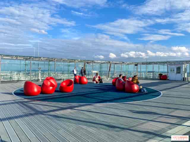 Observation deck at Tour Montparnasse with modular furniture for corporate networking events.
