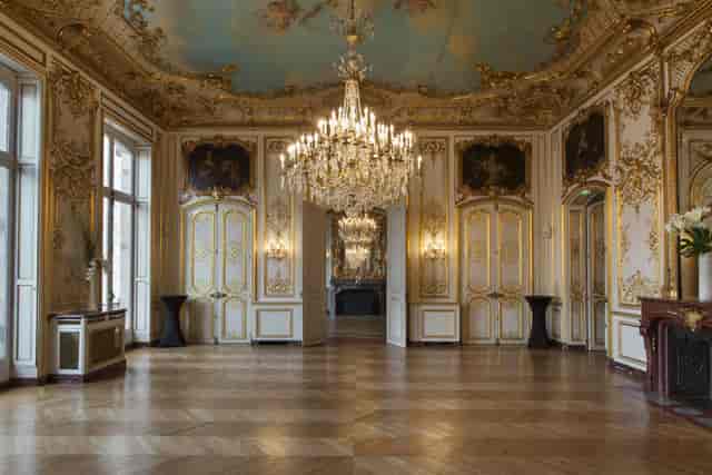 Luxury ballroom at Hôtel Le Marois with ornate chandeliers for gala and reception events.