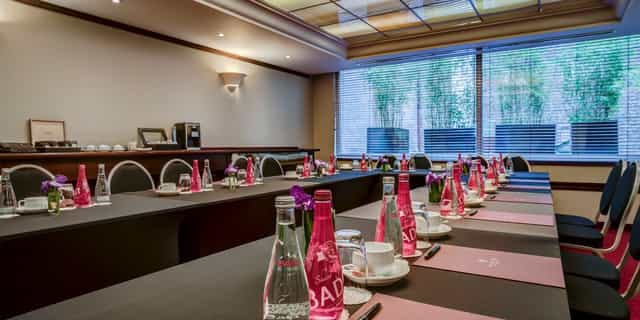 U-shape boardroom at Salon Imprimatur, Hotel Pont Royal for corporate meetings and event space.