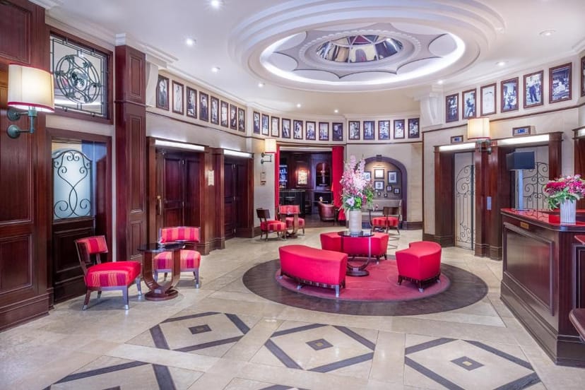 Elegant Salon Bibliothèque hotel lobby for VIP welcome receptions and event registration.