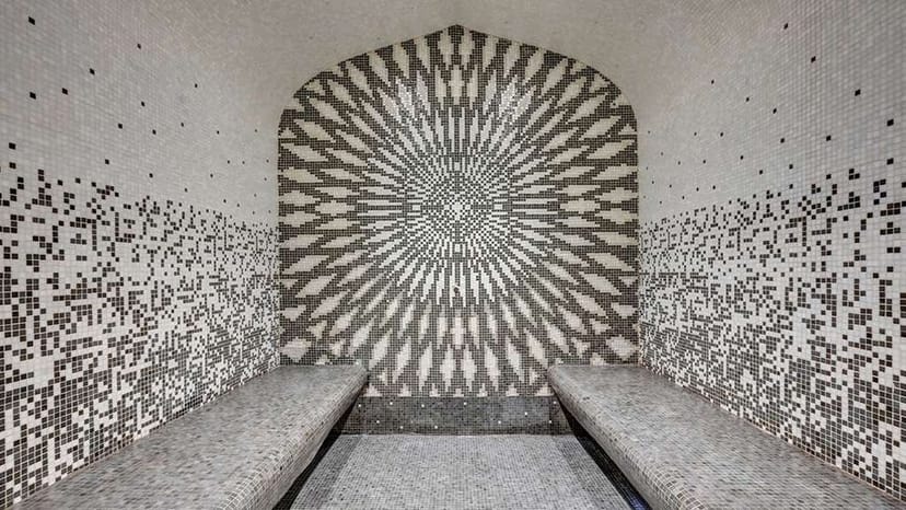 Luxury steam room at The One Alma Paris for VIP wellness retreats and incentive travel.