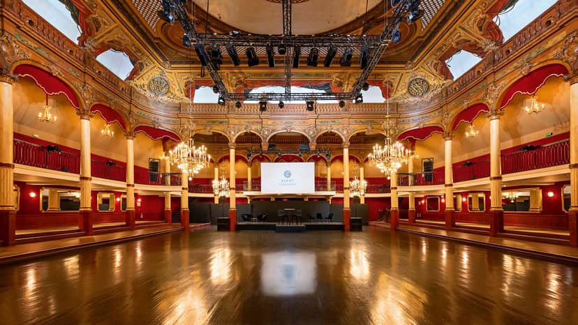 Wagram Pavillon historic ballroom with stage, ideal for gala events and corporate conferences.