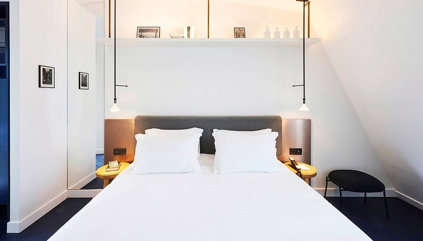 Modern boutique hotel lobby, Hôtel Perpetual Paris, luxury business travel accommodation.