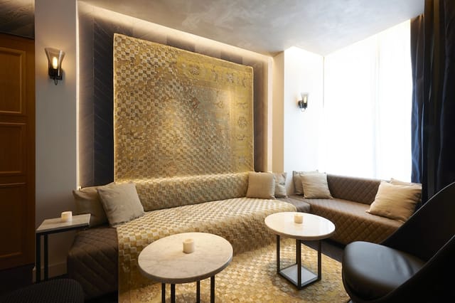 Sophisticated hotel lobby with plush seating for executive board meetings and private consultations.