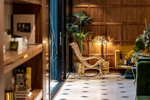 Boutique meeting lounge in Hôtel Parister & Spa, residential-style space for luxury events.