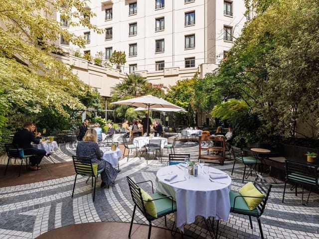 Upscale urban courtyard restaurant for professional networking and corporate events.