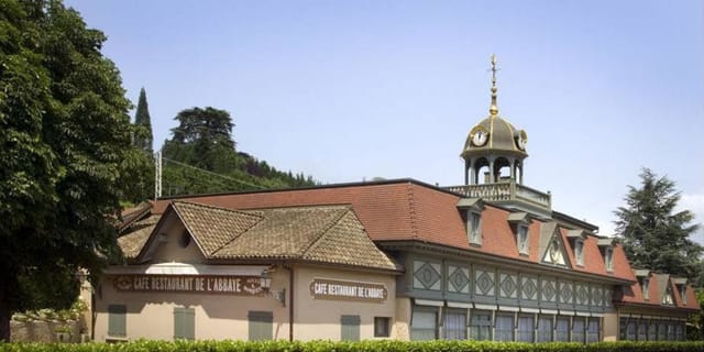 Seminary at Abbaye de Collonges: picturesque historic venue for corporate retreats and dinners.