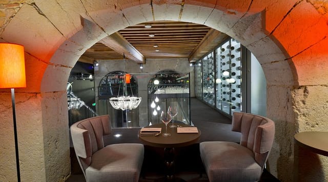 Elegant Burgundy restaurant for VIP breakout sessions and high-end corporate negotiations.