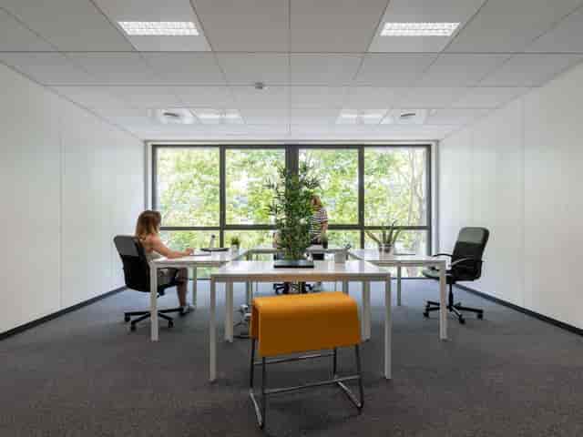 U-shaped boardroom at Focus Coworking, ideal for productive corporate meetings and workshops.