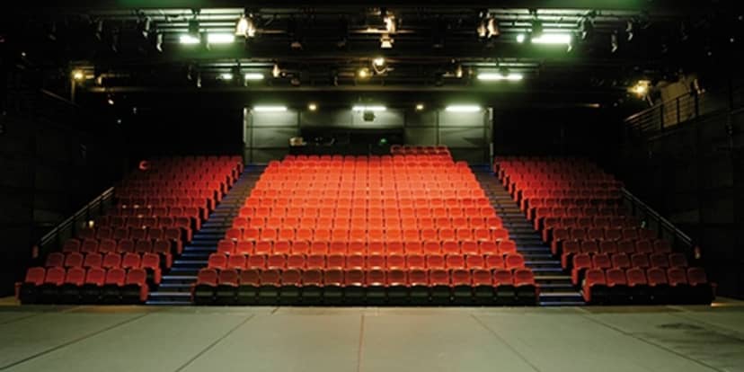 Centre Pompidou auditorium with red seating, ideal for corporate keynote and plenary sessions.