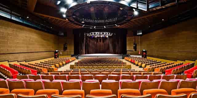 Auditorium at Centre Pompidou with tiered seating, perfect for corporate events and conferences.