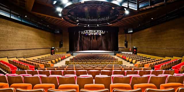 Auditorium at Centre Pompidou with tiered seating, perfect for corporate events and conferences.