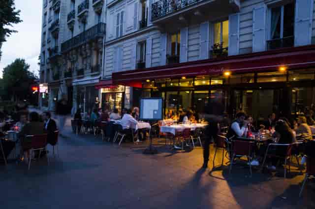 Vibrant outdoor cafe in Le Marly, perfect for networking events and social gatherings.